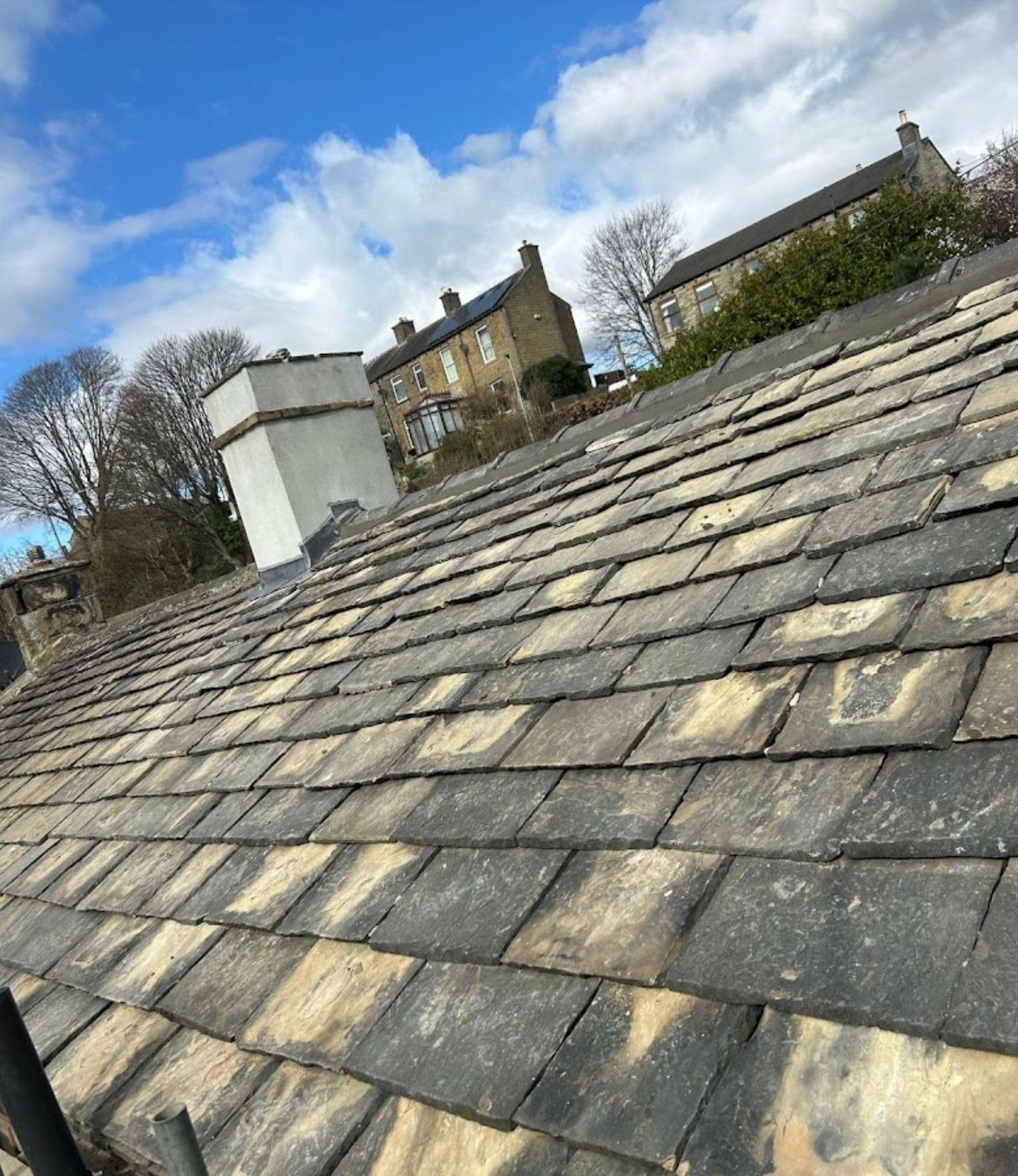 Traditional stone slate roof on a Yorkshire stone house before restoration