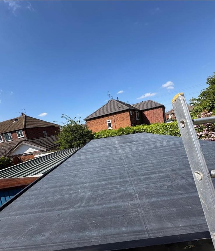 Completed single-ply flat roof laid over a garage in West Yorkshire