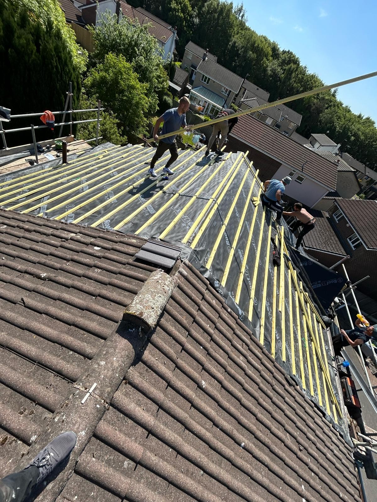 New battens and membrane going on during a pitched re-roof