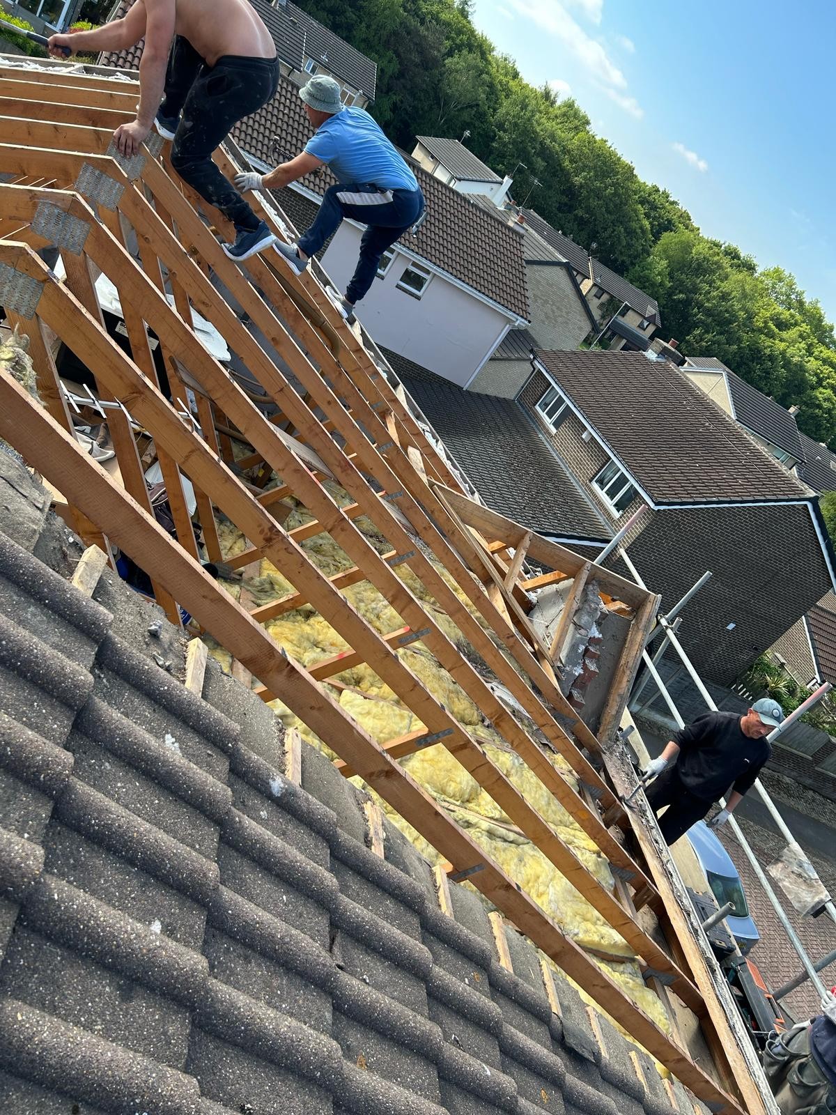 Old roof covering stripped ready for a new pitched roof