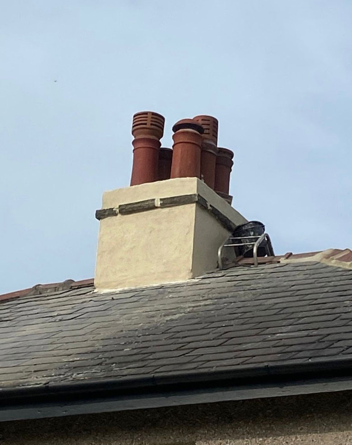 Rebuilt and rendered chimney stack with new clay pots after chimney repairs in Yorkshire